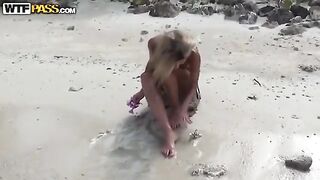 A couple enjoys private sex directly on the Russian beach