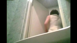 A hidden camera in the toilet captures a graduate's intimate moment