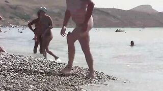 A group of nudists are having fun on the coast of Crimea