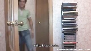 The young man shoots an amateur video of himself with a girl on the bed
