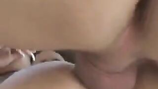 A pussy under a skirt without panties was shot with a camera