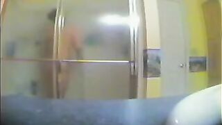 A girl took a shower, not knowing that someone was secretly filming her