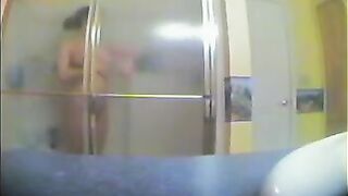 A girl took a shower, not knowing that someone was secretly filming her