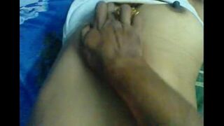 Husband massaged her tits, making his wife moan with pleasure