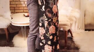 A man fucked a sexy red-haired vampire in a long black dress and stockings