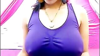 A girl is excited and her nipples are sticking through T-shirt