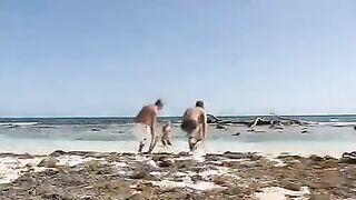 Blonde FFM threesome sex on the beach