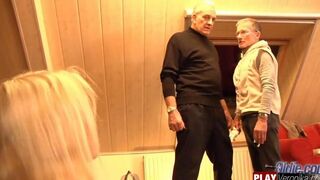 A young blondie is fucking with a bearded guy wearing glasses