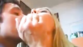 A blonde is having fun with two guys at the same time, getting great pleasure