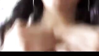 A couple enjoying private moments at home, getting intimate on camera