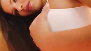 A girl plays with her big pussy with dildo in close-up
