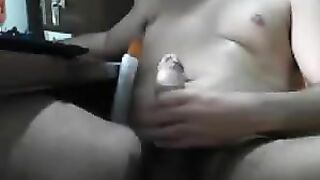 The guy masturbates sitting in front of the computer