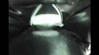 The husband and wife play with latex costumes, having fun
