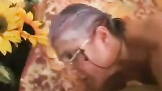 The man fucked a sexy gray-haired woman in black stockings hard