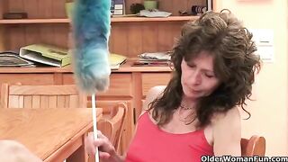 A mature woman caresses her pussy during hot masturbation