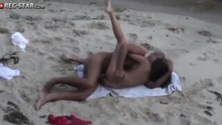 A couple has sex on the hidden beach and gets caught