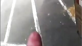The guy just does not care and jerks off his cock on the street