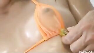 A whale in a bikini is gently prepared for sex