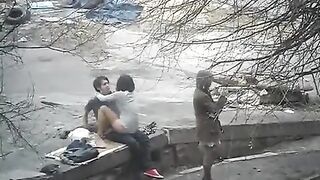 The guy was shooting sex with a girl on the city streets