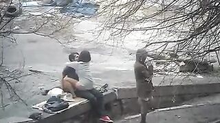 The guy was shooting sex with a girl on the city streets