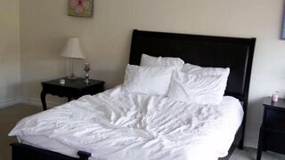 Two cute girls are having fun in the bedroom with delicate sex