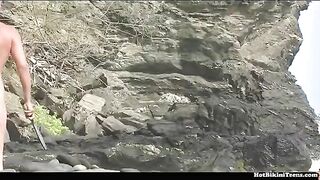 A guy shooting amateur video at a nudist beach with girls