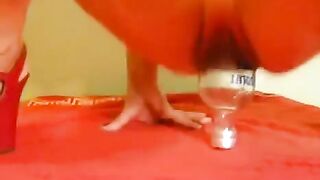 Fisting with a bottle and a large dildo