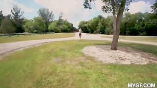 Outdoor fun with a girl in the park, she shows her boobs