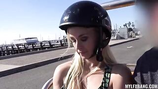 A wild blondie in action, showcasing her beautiful assets