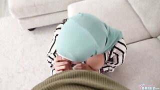 A sexy girl in a hijab plays with her boobs and gets fucked on the couch