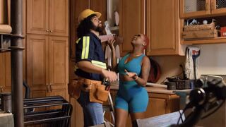 A girl is playing a role for her boyfriend on the kitchen in uniform