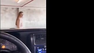 A red-haired beauty got a little excited in the public garage