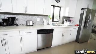 A mature woman is completely naked while cleaning the house