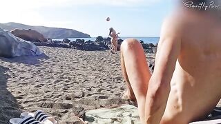 Two girls almost got caught while jerking off with a guy on the nude beach