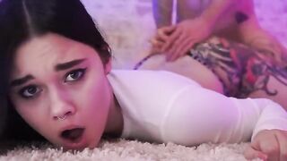 The man is pushing his cock deep into the girl’s pussy