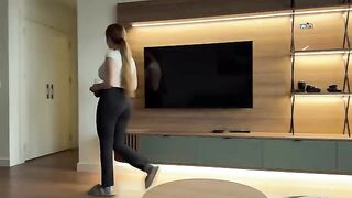 The girl works as a maid and cleans the house