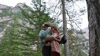 A couple enjoys passionate sex right in the forest
