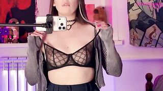 A hot brunette in stockings caresses herself with a mirror, reaching intense heights